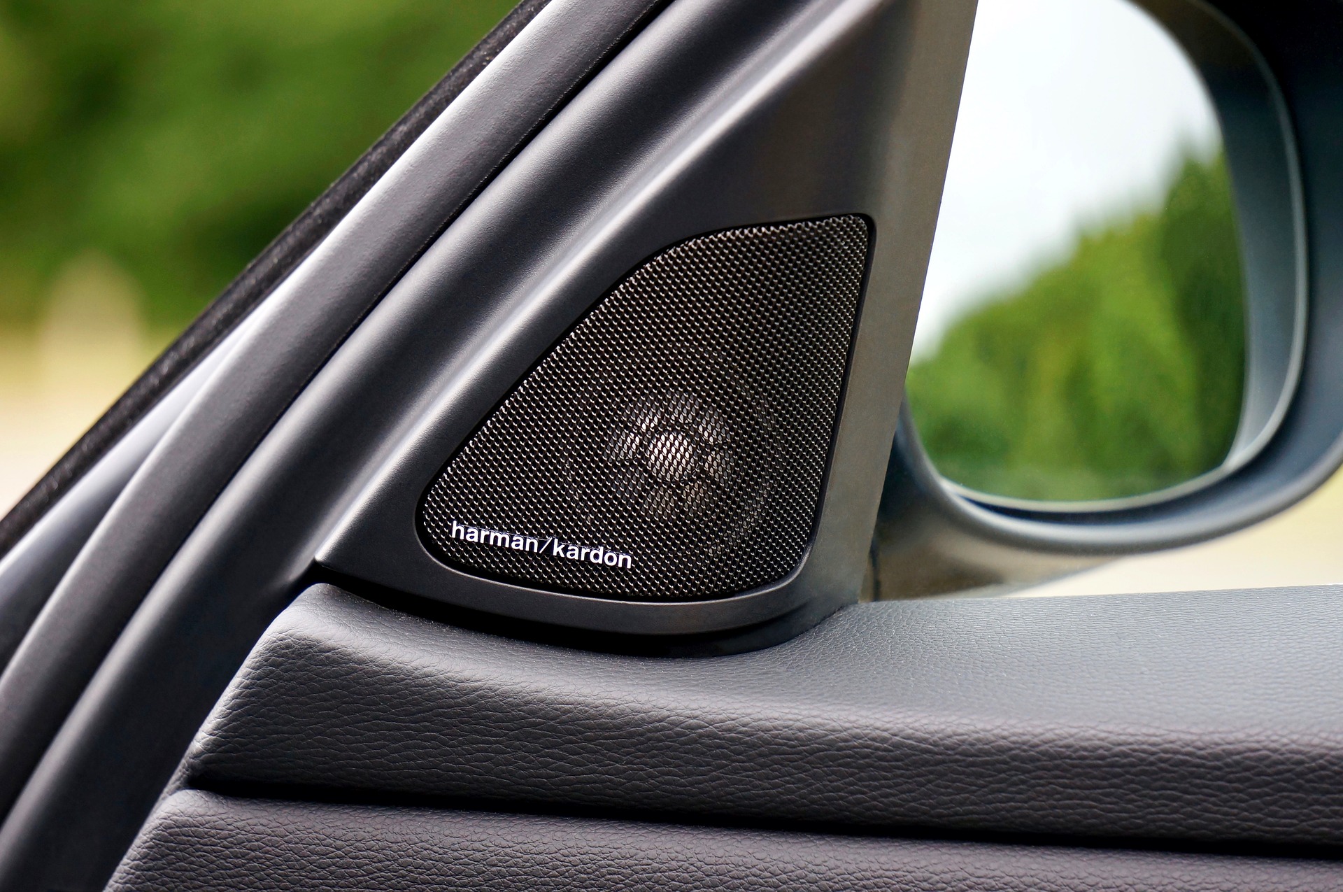 gray speaker inside the car